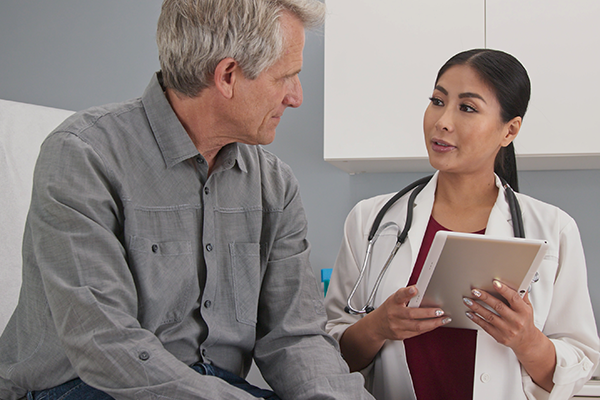 Doctor talking with patient